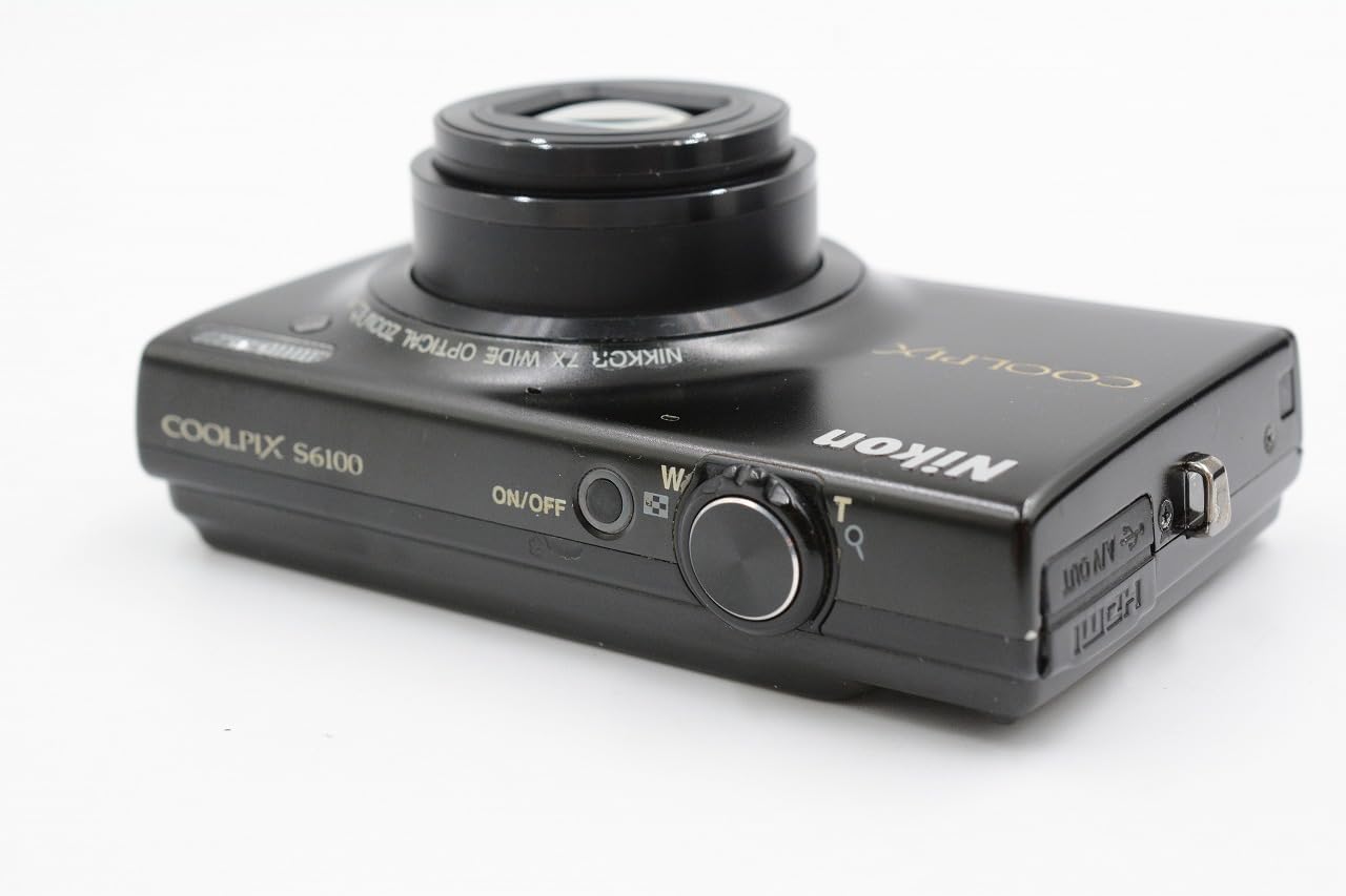 Nikon COOLPIX S6100 top and rear view showing power button, shutter, zoom lever, and ports.