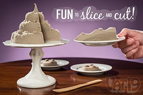 Brookstone Snd molded into a cake-like structure on a stand, with a slice cut out and placed on a plate.