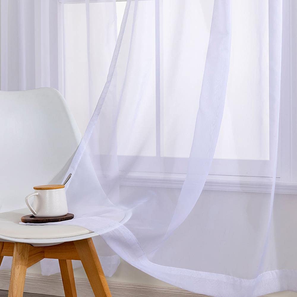 Cortinas de tul blanco para salón y dormitorio que aportan luminosidad y elegancia natural