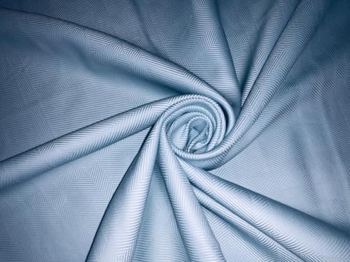 Tissage à chevrons coton italien bleu pour créer un vêtement qui a une histoire