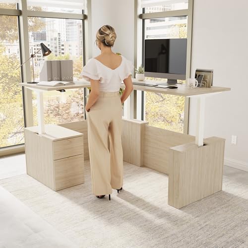 Image of Bush Business Furniture 60-inch Height Adjustable L Shaped Standing Desk with File Cabinet, Ergonomic Sit-Stand Computer Table for Office, Stratus Collection, Natural Elm with White Base