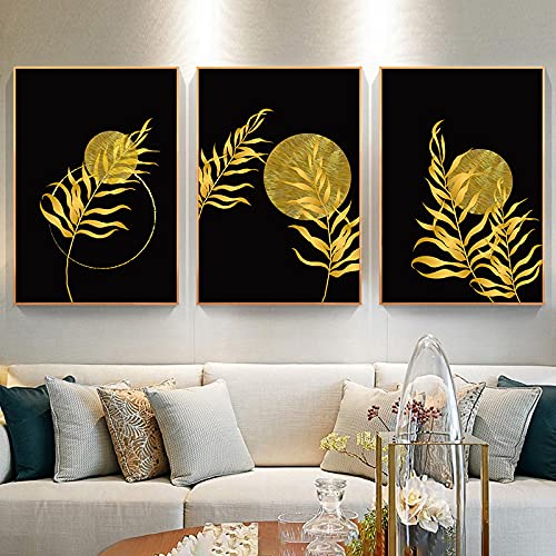 Feuilles de palmier dorées : sublimez un grand mur vide avec ce triptyque noir et or