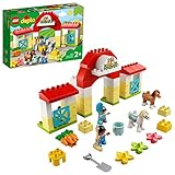 ​​​​Das LEGO DUPLO Set „Pferdestall und Ponypflege“ (10951) lässt junge Tierfreunde viele Stunden fantasievoll spielen. Er ist alles vorhanden, was Kleinkinder brauchen, um die beiden süßen Ponys zu versorgen.