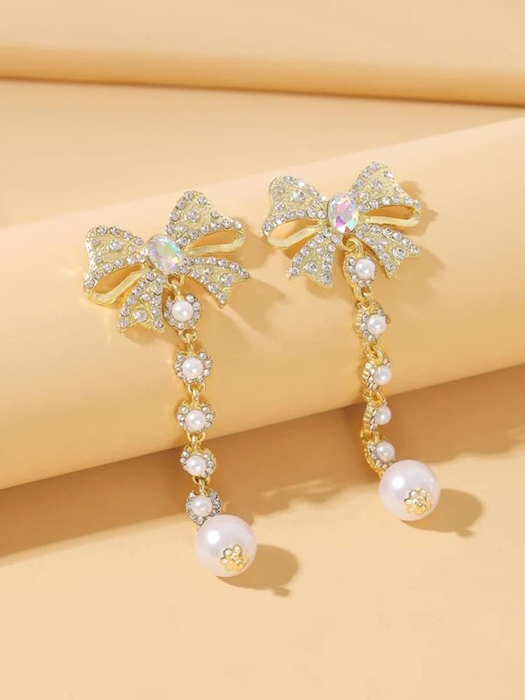 Crystal Dangler Earrings with Bow Shaped Pearl Danglers