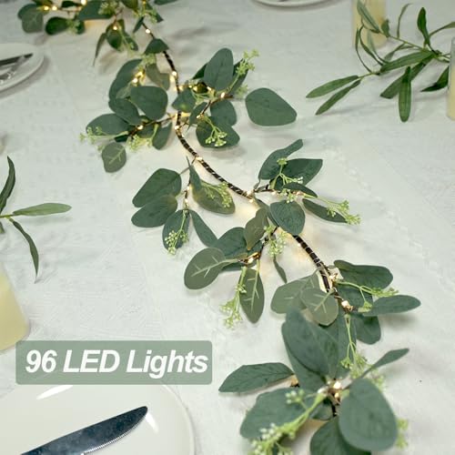 Image of 6FT Eucalyptus Garland with Lights, 96 LED Artificial Silver Dollar Eucalyptus Vine with Flowers, 8 Modes Timer Battery Operated Lighted Greenery Garland for Wall Bedroom Wedding Farmhouse Home Decor