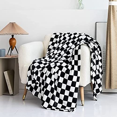 Couverture canapé damier pour vos soirées cocooning au salon