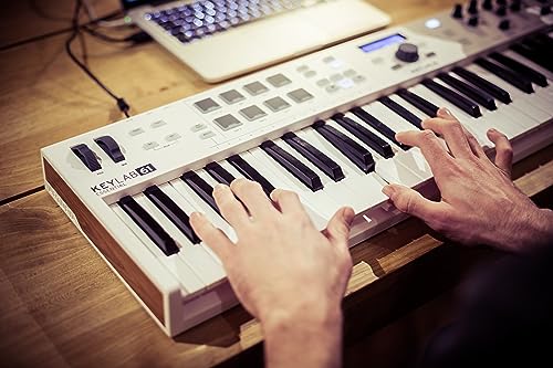 Image of Arturia KeyLab Essential 61 mk3 MIDI Controller with 61 Velocity-Sensitive Keys, 9 Encoders, 9 Sliders, 8 RGB Pads - USB-C, Midi Out, LCD Screen, Bundled Software and DAW Integration - Black
