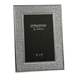 Dieser Bilderrahmen ist für Fotos mit den Maßen 13 cm x 18 cm geeignet.