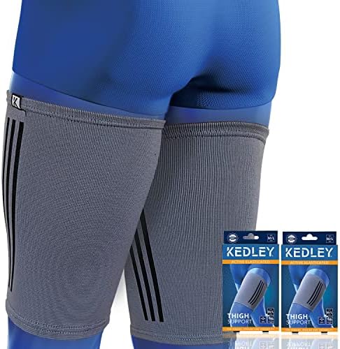 Kedley Thigh Support Sleeve | Advanced Elasticated Compression Band with Strap | Pulled Hamstring, Strained or Bruised Muscles and Quad Injuries | Protects and Aids Active Rehabilitation (M/L) Black