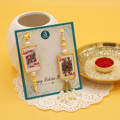 UtsaWe Rakhi Gift Box | Rakhi Gift Hamper made with a King Bhaiya and Queen Bhabhi Rakhi, Roli, Chaval, Mini Thali Set, Greeting Card, and Chocolates | Lumba Rakhi | Bhaiya Bhabhi Rakhi Set (Bhaiya Bhabhi Rakhi Set 4)2