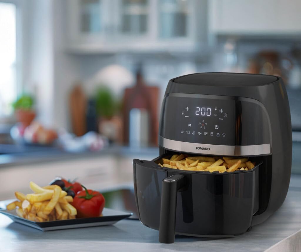Front view of the Tomado TAF3202B Airfryer showing the digital display and control icons.