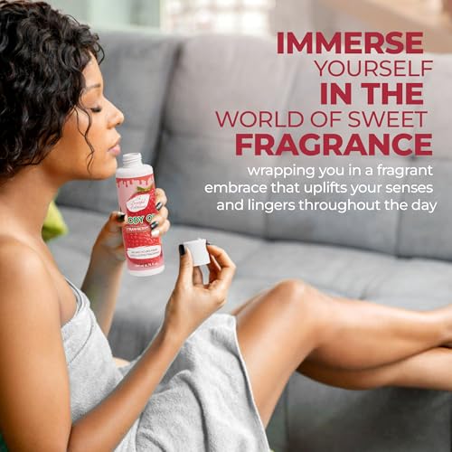 Image of Body oil designed for Deep Hydration to nourish, protect, and rejuvenate the skin while leaving it with a soft, radiant glow and a strawberry scent long -lasting fragrance, jojoba oil and more 6.76oz