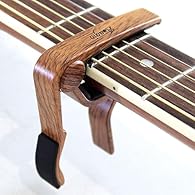 ✔︎ Adagio Pro Deluxe Capo Rrp £10.99 - Quick Release allows the instant and easy changing of your guitars key for songs and song writing. An essential gadget for any guitarists. clamps down across the guitar's fingerboard at a particular fret. Capos ...