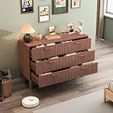 Créer une ambiance chaleureuse : Ce meuble de rangement en bois, agrémenté de vases, de cadres photo et de plantes, crée facilement un coin cosy dans votre maison et devient un véritable atout esthétique. La couleur du bois de noyer possède un aspect apaisant, offrant une expérience de vie confortable et relaxante pour la famille, renforçant le bonheur au foyer et correspondant parfaitement au besoin des familles européennes d'un environnement de vie chaleureux et accueillant.