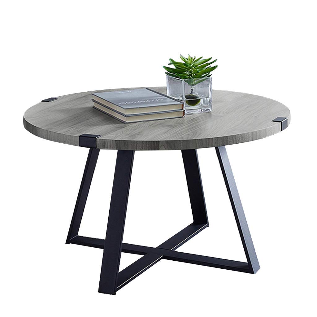Table basse ronde en bois gain de place pour optimiser les petits salons