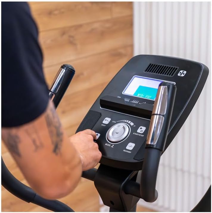 Close-up view of the BH i.Quantum II elliptical trainer's LCD console with various buttons and display showing workout metrics.