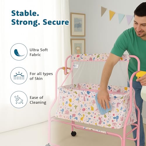 Image of Amazon Brand - Supples Baby Cradle with Swing & Mosquito Net | 0-8 Months | Swing Lock | 4 Wheels with Brake | Soft & Comfortable for Baby Sleep | Sturdy Mild Steel Frame | Pink