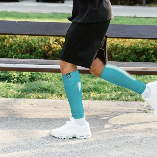Image of KUE Compression calf sleeves for men and women | Running, Sports Activity | Improved Blood Circulation, Swelling, Calf Support in Muscle Fatigue & Recovery (Turquoise, L /XL)