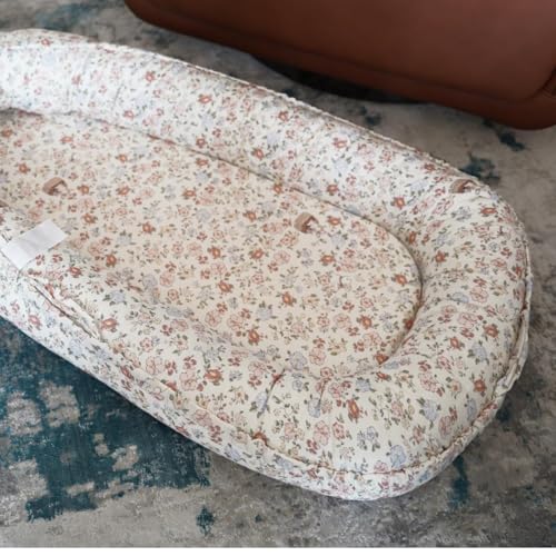 Image of CooCooBaby Infant Lounger, Baby Nest Cover for Baby Girls & Boys, Newborn Essentials for Baby 0-12 Months, 100% Cotton Breathable (Wonderland Muslin)