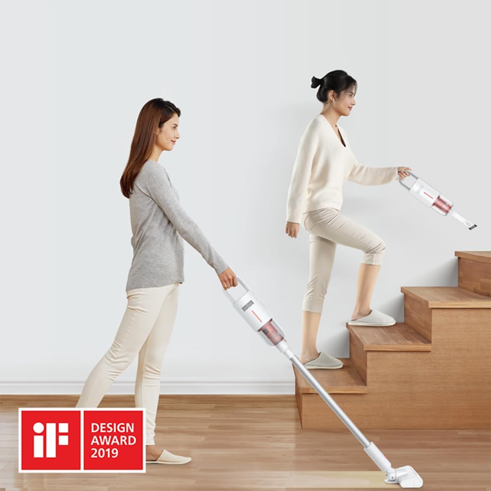 Woman vacuuming under a bed with Deerma VC20 PLUS