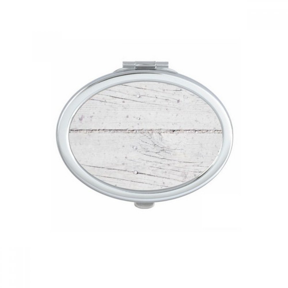 Miroir compact ovale de poche au design texture bois brut