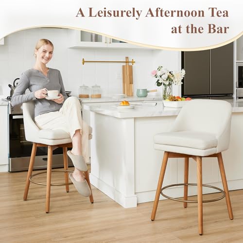 Image of kinmars Modern Bar Stools Set of 2,Swivel Counter Height Bar Stools with Soft Upholstered Back,Thick Seat,Wooden Legs, 27 inch Counter Stools for Kitchen Island (Beige, 2 Pieces - 27 inch Counter Height)