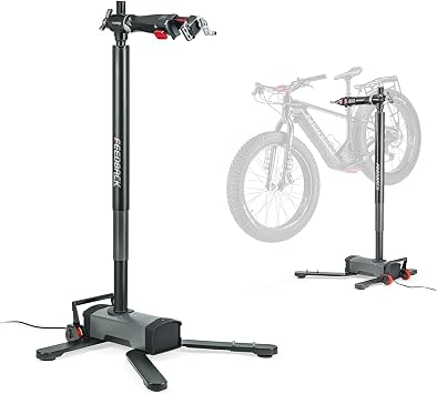 Feedback Sports Pro E Lift Bike Repair Stand, 100lb Capacity, For E-Bikes | Foot-pedal electric lift raises heavy bikes hands-free; mobile tilt-and-roll base supports home and shop workflows
