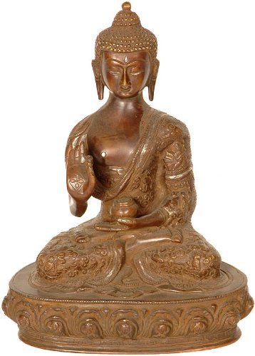 Bouddha introspectif en laiton pour créer un coin méditation et yoga serein à la maison