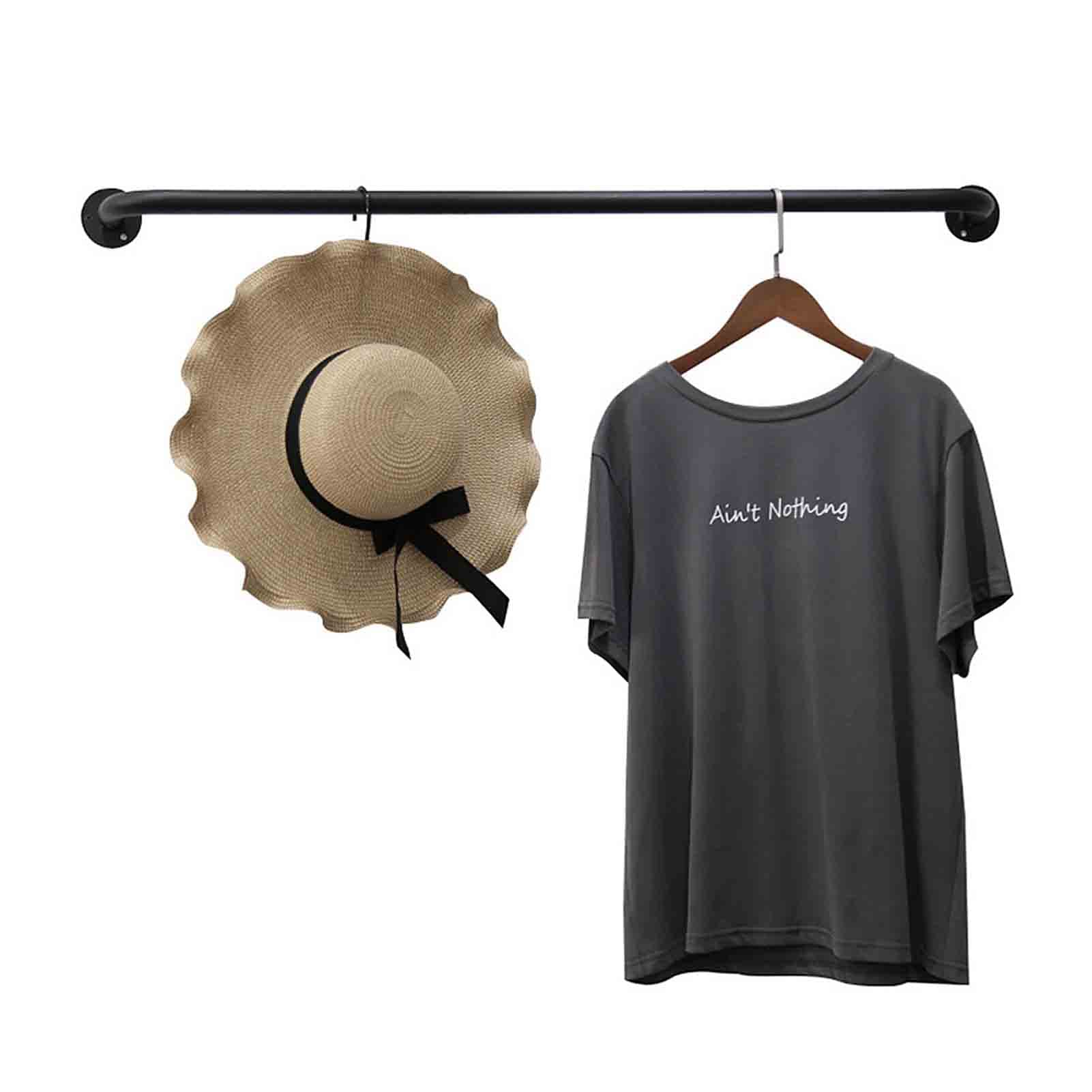 Porte-vêtements en tuyau industriel pour un dressing de chambre rétro