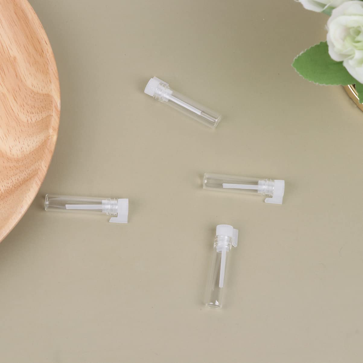 500 sztuk perfum butelki wielokrotnego napełniania szklana butelka klips do długopisu pojemnik na drobną mgiełkę z pokrywką pojemniki z rozpylaczem wielokrotnego napełniania puste perfumy podróżny poj
