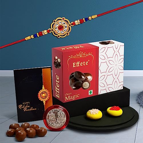 Image of DeoDap Fancy Rakhi Gift Combo with 32gm Chocolate, Pooja Thali, Roli Chawal, Pooja Coin & Greeting Card for Brother - Multi-Colour