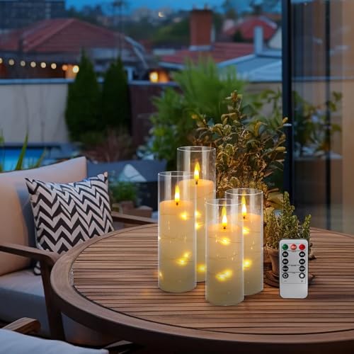 Image of Pack of 12 Ivory Flickering Flameless Candles (D2.2 X H 5 inch 6 inch 7 inch) Battery Operated with Remote, White LED Pillar Candles with Realistic Moving Wick for Halloween, Christmas, Home Decor & Wedding.