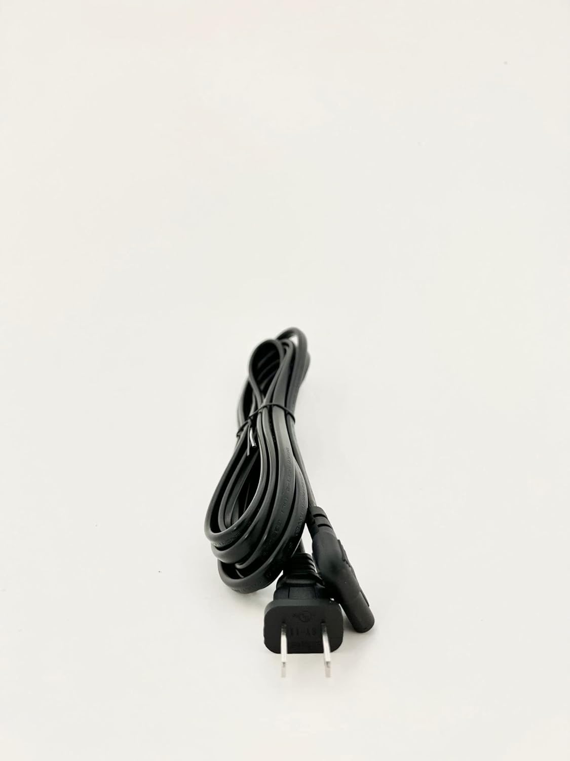 Close-up of the L-shaped connector on the OMNIHIL AC Power Cord