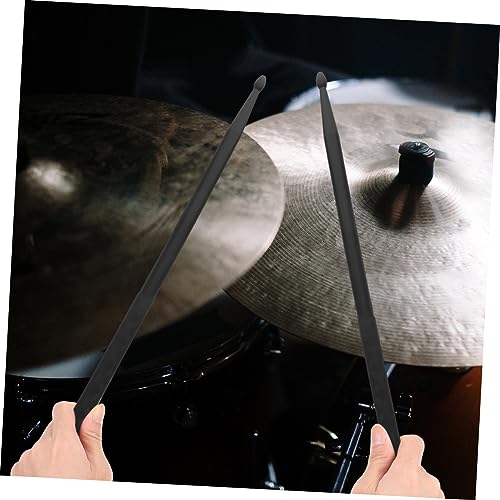 Par de baquetas negras con grip para batería y percusión miniatura 5