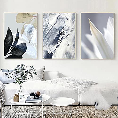 Tableau feuille canapé nordique pour une décoration murale chambre et salon relaxante