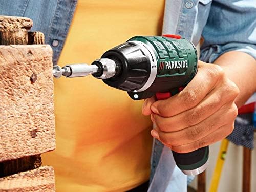 User operating PARKSIDE PSSA 4 A1 on a wooden block