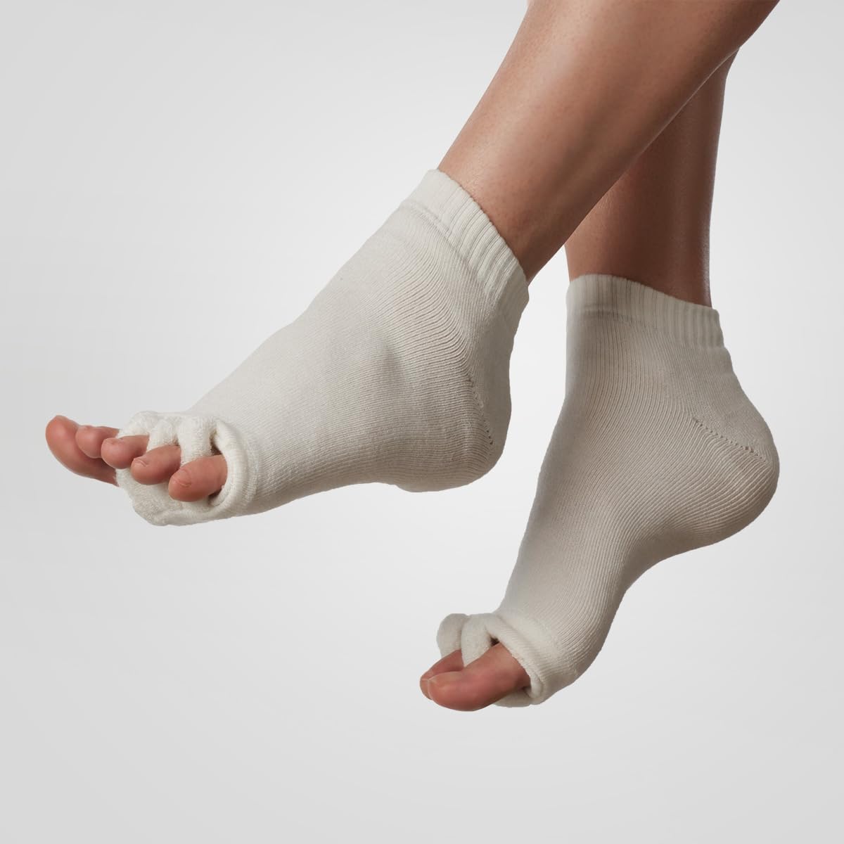 Moisturizing Toe Alignment Socks by Sharper Image