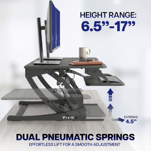 Image of VIVO 54 inch Manual Height Adjustable Large Standing Desk Converter, Quick Sit-Stand Desk Riser, Tabletop Pneumatic Assist Height Adjust 6.5 to 17 inch, Black, DESK-V054V