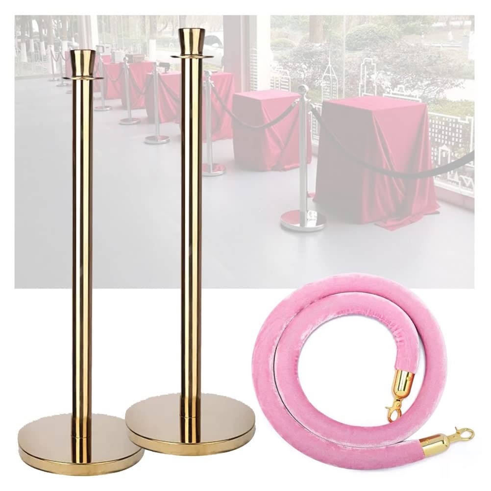Barrières de contrôle des foules avec poteaux dorés et cordons velours rose d'exposition