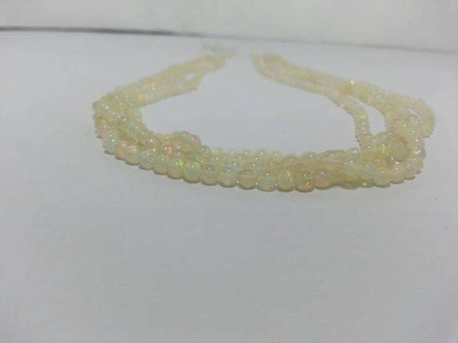Opal Ethiopian Plain Round Beads les perles idéales pour accessoiriser vos tenues de soirée