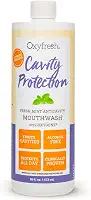 Oxyfresh Enxaguante bucal com flúor com proteção contra cavidades – Enxaguante bucal anticavidade para dentes sensíveis – sem manchas, sem álcool – Hálito fresco duradouro. 473 ml.