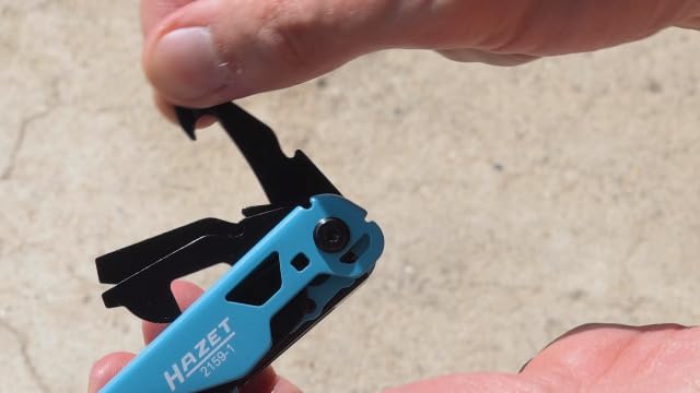 Bild 6 - HAZET Multitool 2159-1, 13-in-1, Edelstahl, mit Spitzzange, Messer, Säge, Schraubendreher, Sechskantschlüssel, Schere, Gürtelclip, inkl. robuster Gürteltasche