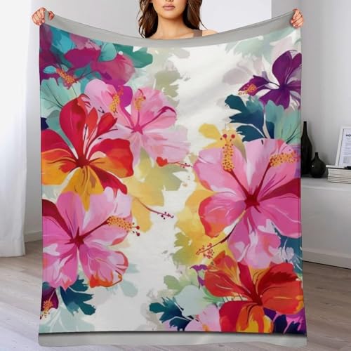 Couverture à imprimé floral hawaïen contre le froid hivernal sur le lit