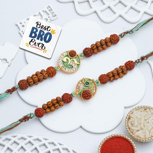 Image of eCraftIndia Om Peacock Feather Rudraksha Rakhi Set of 2 | Rakhi for Brother Bhaiya Bhai with Best Bro Ever Fridge Magnet | Roli Chawal Pack