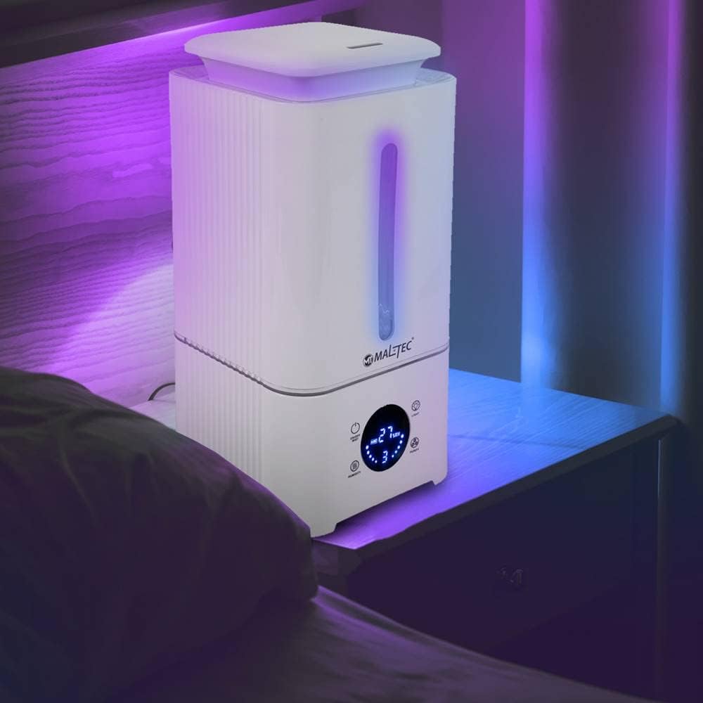 Maltec WT-3400KW humidifier with a purple night light glowing in a dimly lit bedroom.