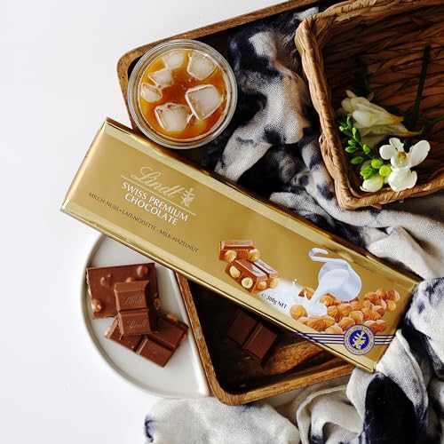Lindt Maxi Tablette SWISS PREMIUM Lait Noisettes au Lait - vue 4