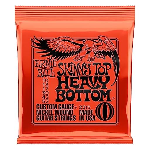 Ernie Ball Skinny Top Heavy Bottom Slinky - Cuerdas para guitarra eléctrica, entorchado de níquel, 1 paquete, calibre 10-52 | Ya disponible en tu tienda friki favorita! En mundofriki.es!