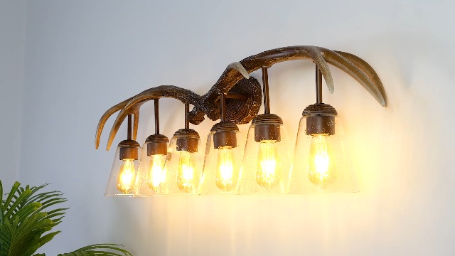 Image of JONATHAN Y 45 inch Brown Wood Finish 6-Light Resin Antlers Vanity Light Wall Sconce Rustic Farmhouse for Living Room Bathroom with Clear Seeded Glass Shades LED Bulbs Included JYL6317A