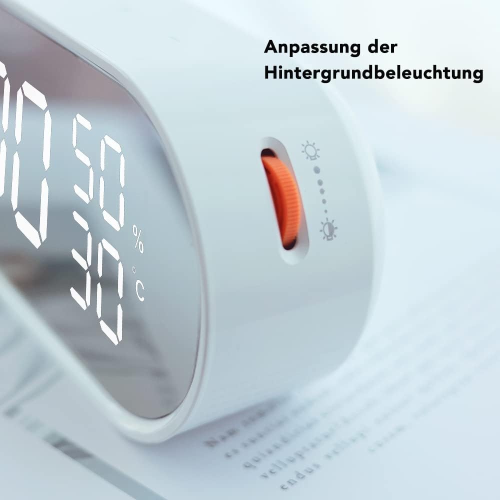 Side view of the FanJu Digital Alarm Clock showing the brightness adjustment wheel.