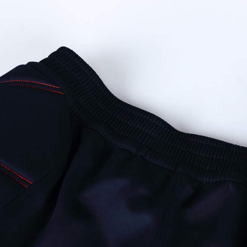 KELME - Juego de pantalones cortos y calcetines acolchados para portero, S, Azul oscuro/ anaranjado